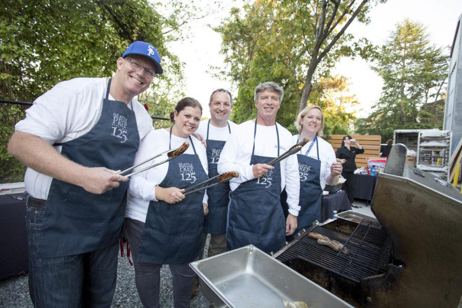 Prep Administrators cook up bratwurst at the 125th birthday celebration. This year marks Seattle Preps 125th anniversary.
