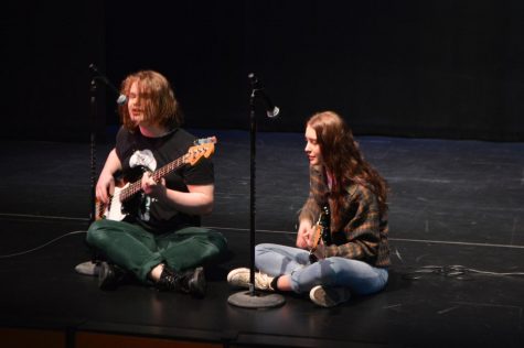 Jackson Shoemaker '22 and Sophia Hawkes '22 perform at the December Coffee House. This is one of three annual performances of the talent show.