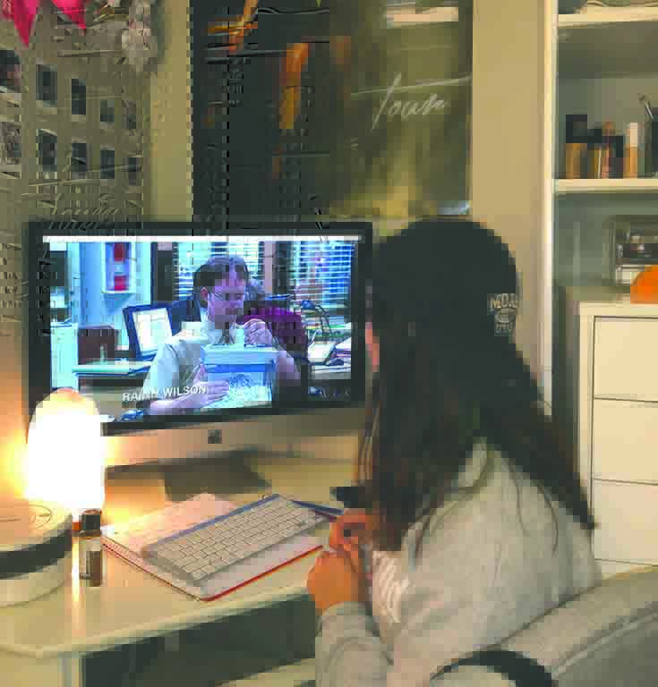 Alianna Lugo ‘21, watches “The Office” at her home during quarantine.
Watching movies and TV shows can bring people together.