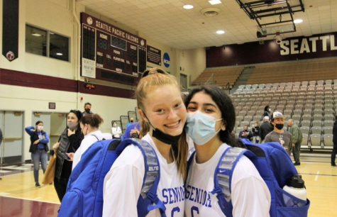Sophomores Megan Moffit and Leyla Nabaie after a game last season.