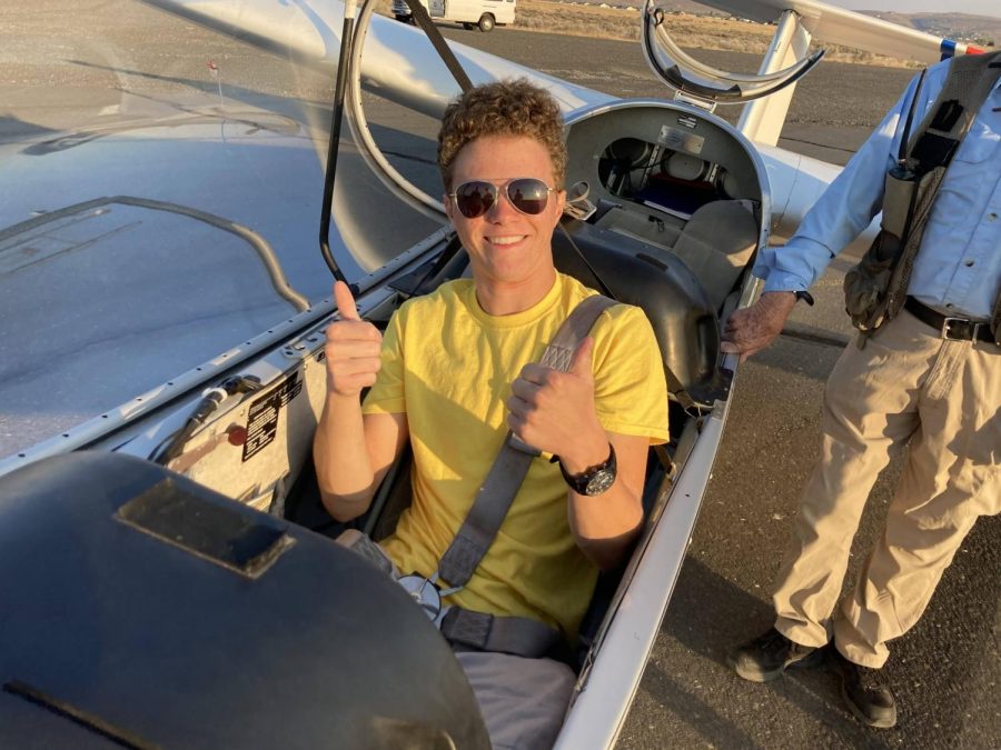 Jack Bianchi giving a thumbs up before a glider solo flight in 2021