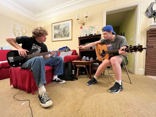Seniors Ben Jammes and Matt Kennedy work on a new song. Their band Discovery Park was formed earlier this year and hopes to continue into college.