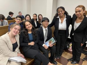 Members of the Varsity Mock Trial Team prior to their district competition. Mock Trial will compete at State beginning on Friday, March 22nd.