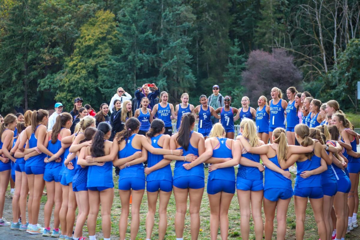 Girls Cross Country get ready before a recent meet. Photo Courtesy of Troy Zaboukos