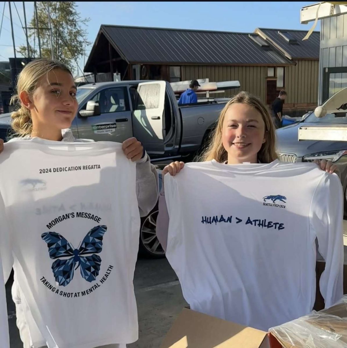 Members of the crew team showing off their Morgan's Message t-shirts which were used to raise awareness for athlete mental health.