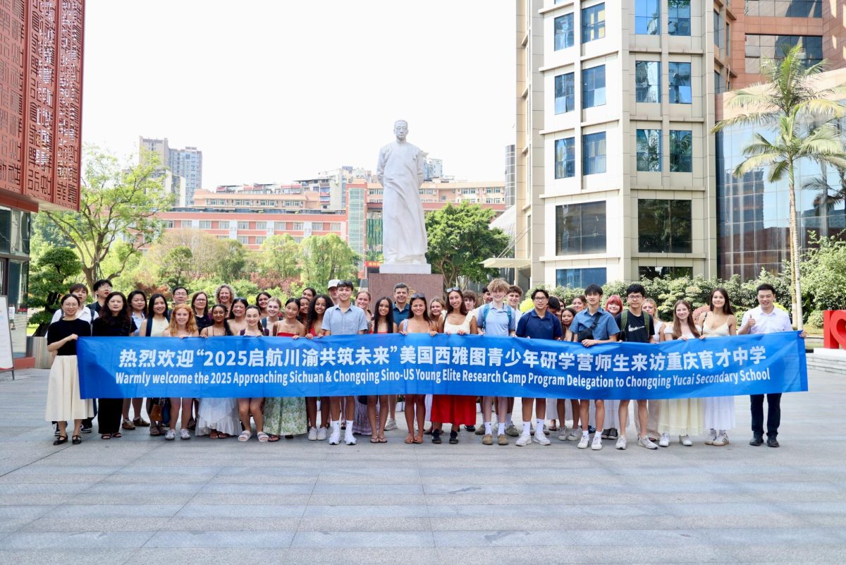 32 Prep students and 5 teachers traveled to the Sichaun Province of China in June. Here, they pose outside of Chongqing Yucai Secondary School. 