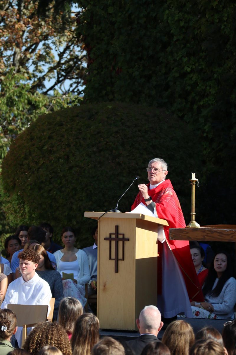 Fr. Moodie giving his thoughtful homily at the Back-To-School Mass